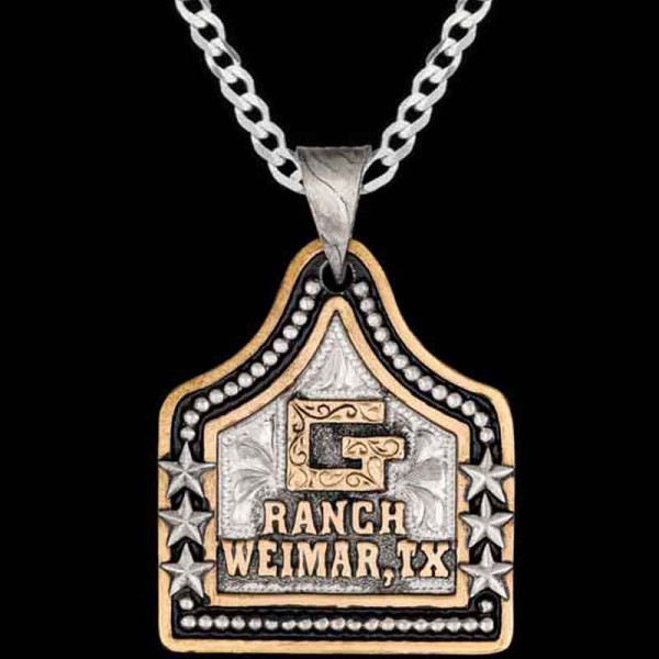 Speckles, German Silver base 1.75"x1.50" framed by a bead edge and stars. Jewelers Bronze Ranch Logo, letters, and a line edge.

Chain not included. 